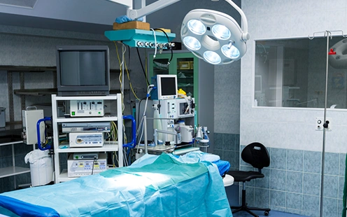 An operating table covered with surgical drapes